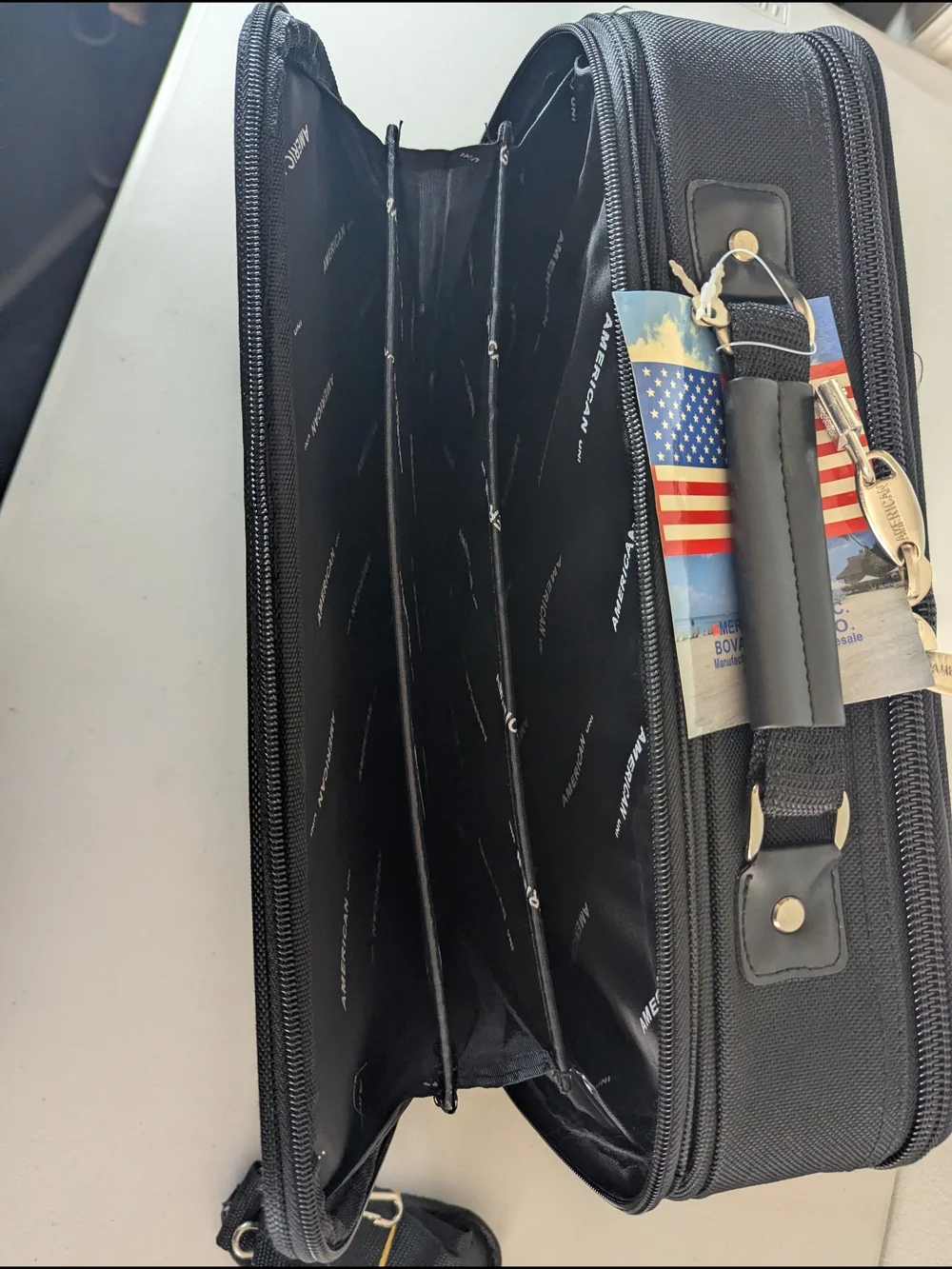 New with tags American Uni travel laptop and document organizer bag in black.